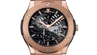 Hublot_classico_ultra-thin_skeleton_king_gold_front_view_white_back